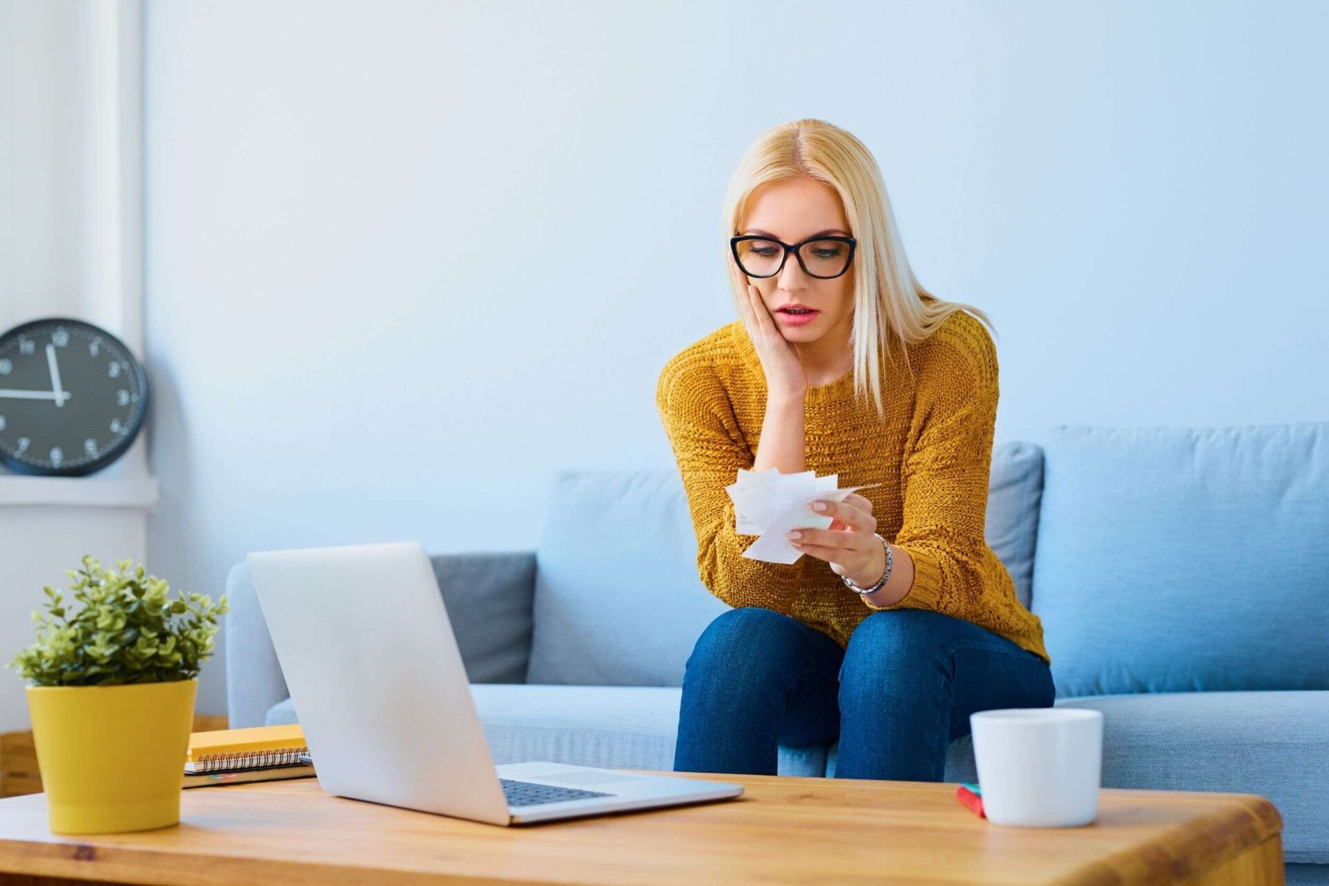 woman worried about her high electricity bill