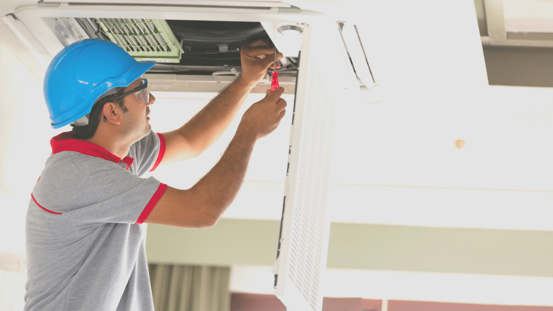photo of air conditioner installer