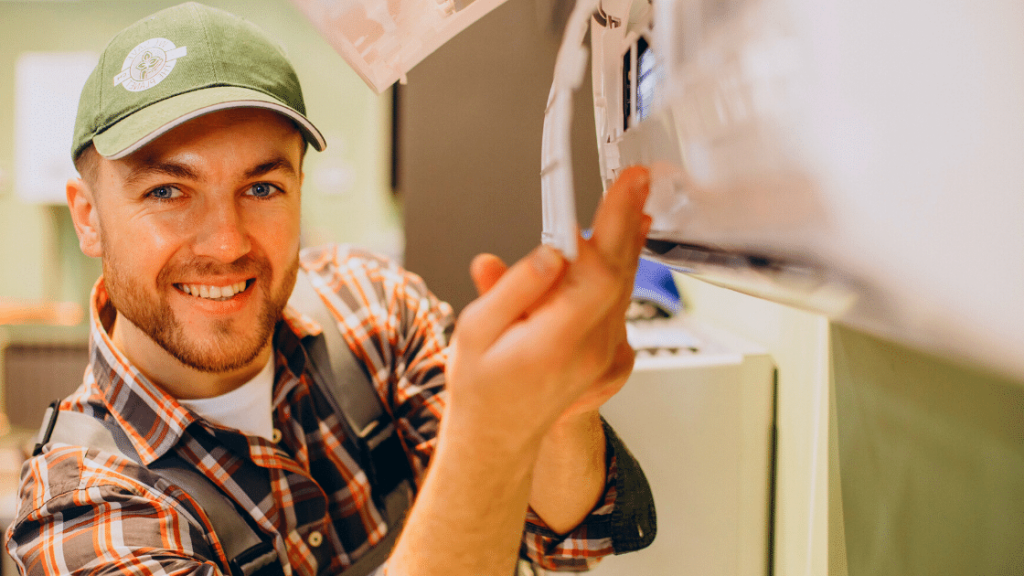 image of an hvac tech working on a ductless mini split