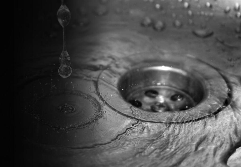 water dripping into sink drain